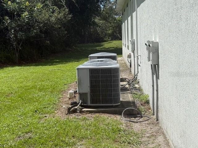 8826 Trevarthon Road Orlando, FL 32817 - Photo 36 of 57 a backyard of a house with table and chairs