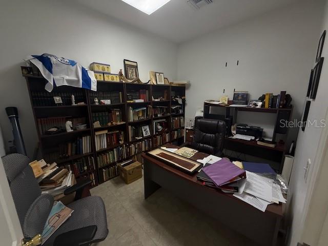 8826 Trevarthon Road Orlando, FL 32817 - Photo 41 of 57 a living room with furniture