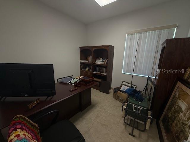 8826 Trevarthon Road Orlando, FL 32817 - Photo 42 of 57 a living room with furniture