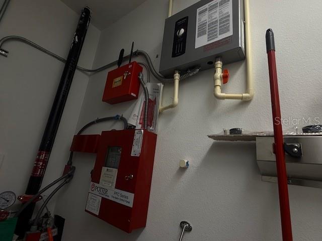8826 Trevarthon Road Orlando, FL 32817 - Photo 49 of 57 a close view of water heater room