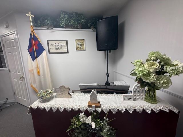 8826 Trevarthon Road Orlando, FL 32817 - Photo 9 of 57 a vase of flowers sitting on a table