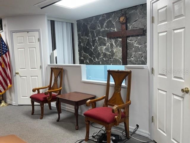 8826 Trevarthon Road Orlando, FL 32817 - Photo 10 of 57 a room with furniture and window