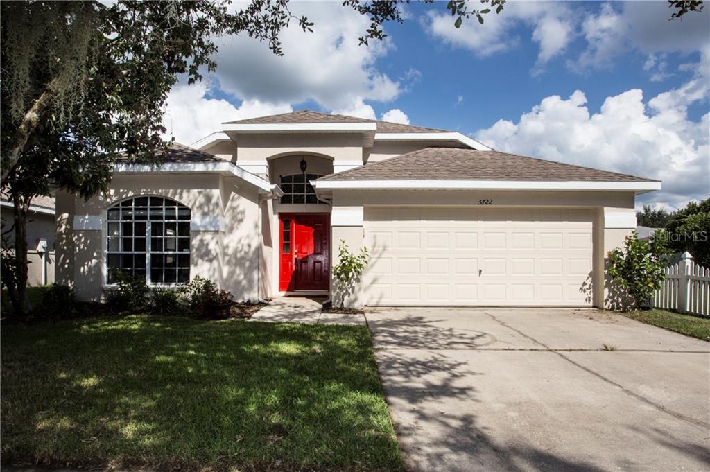 5722 Hawklake Road Lithia, FL 33547 - Photo 1 of 1 FRONT VIEW OF SPACIOUS FISHHAWK HOME