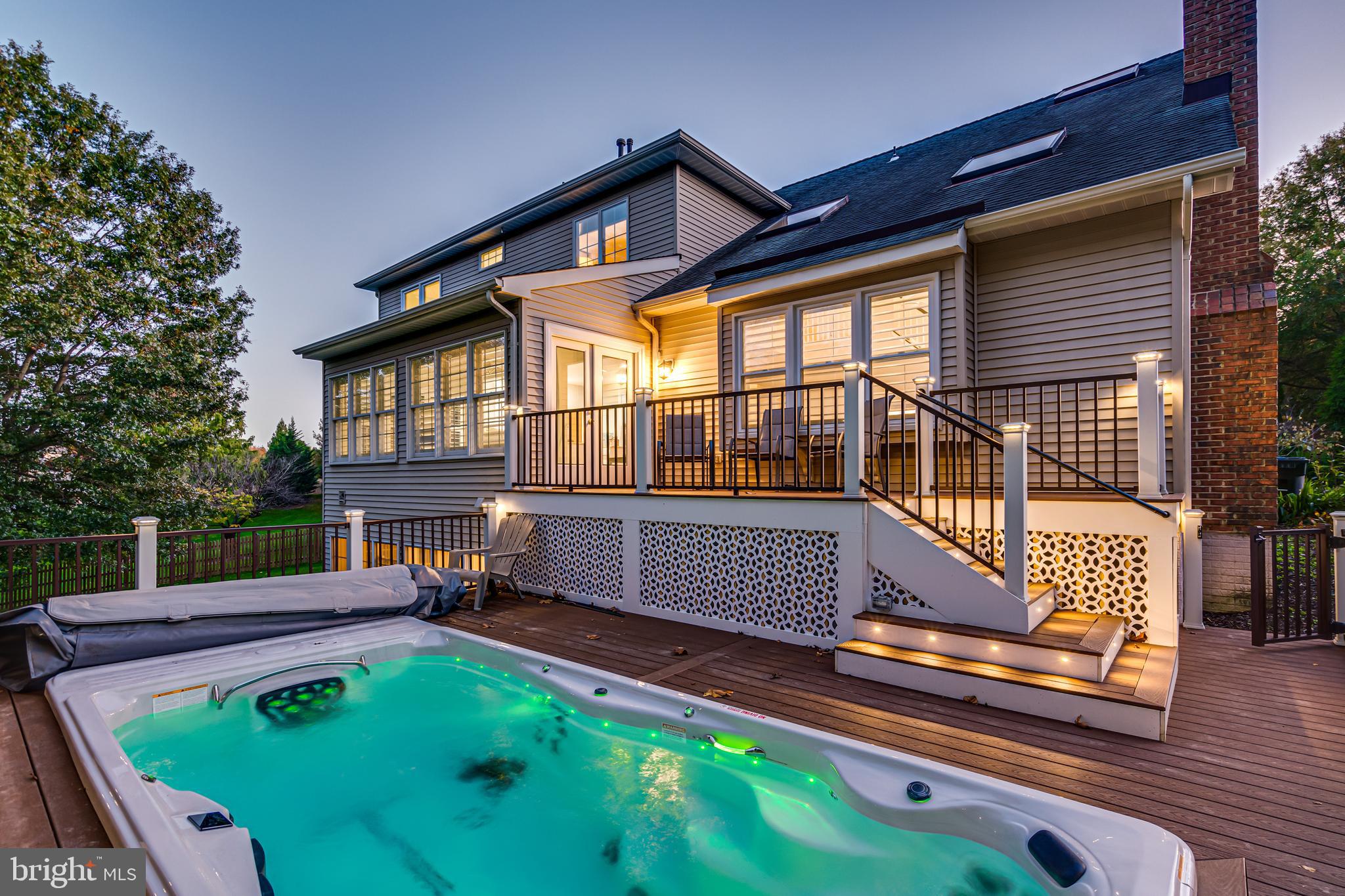 1286 Gatesmeadow Way Reston, VA 20194 - Photo 2 of 56 Evening view of custom lighting on Swim Spa
