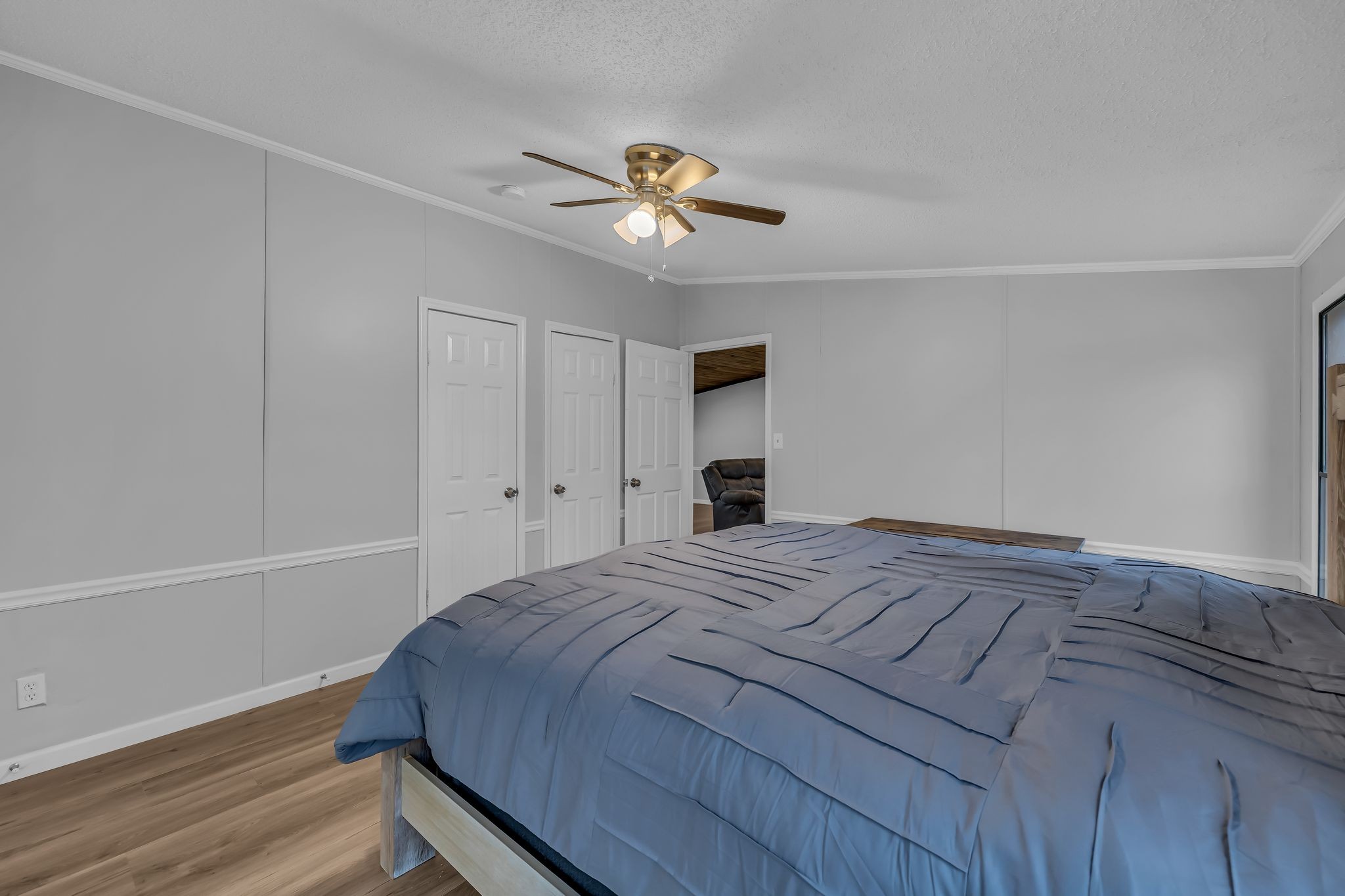 830 Calls Road Estill Springs, TN 37330 - Photo 15 of 35 a bedroom with a bed and a chandelier