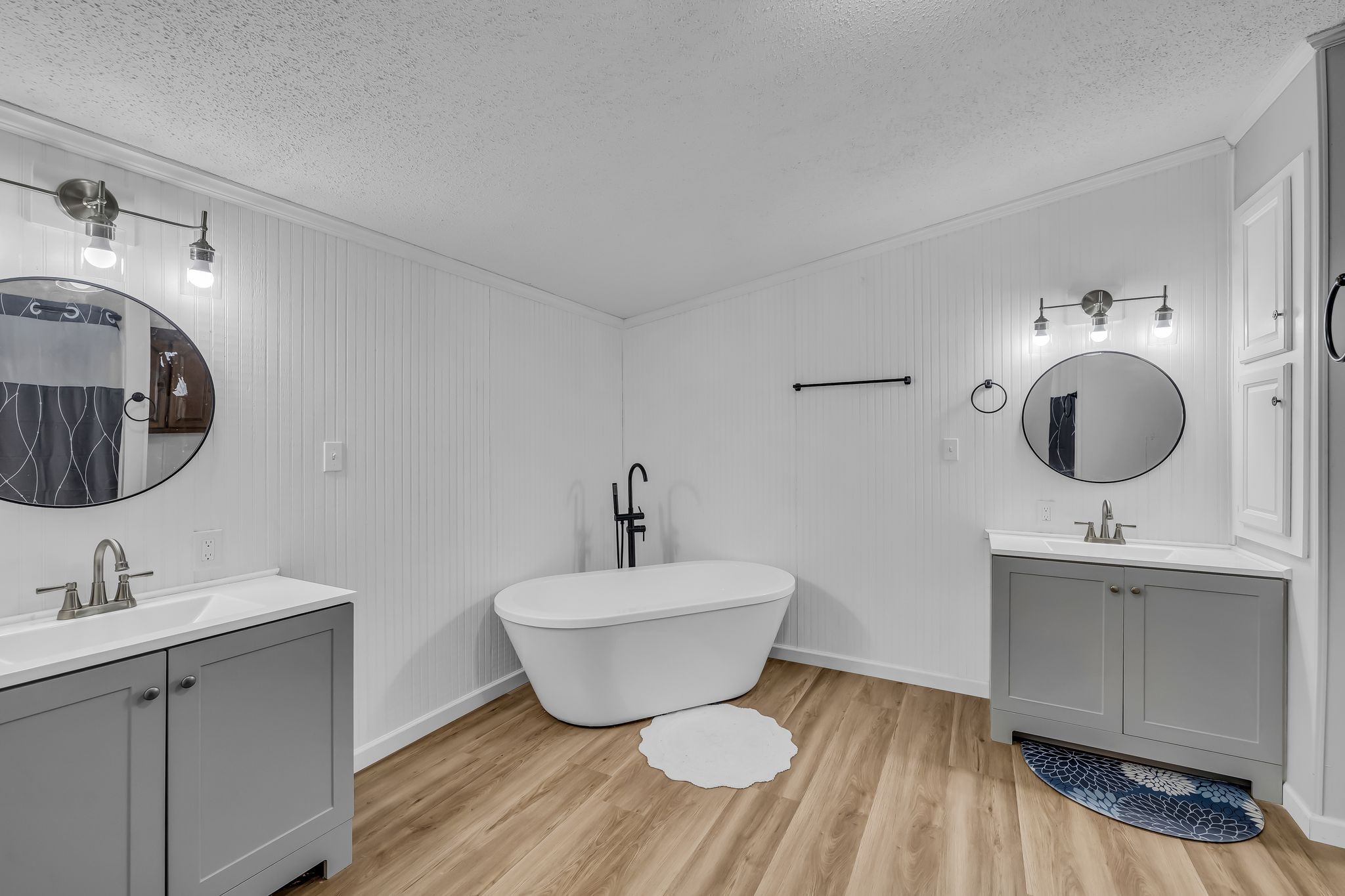 830 Calls Road Estill Springs, TN 37330 - Photo 17 of 35 a bathroom with a toilet a sink and mirror