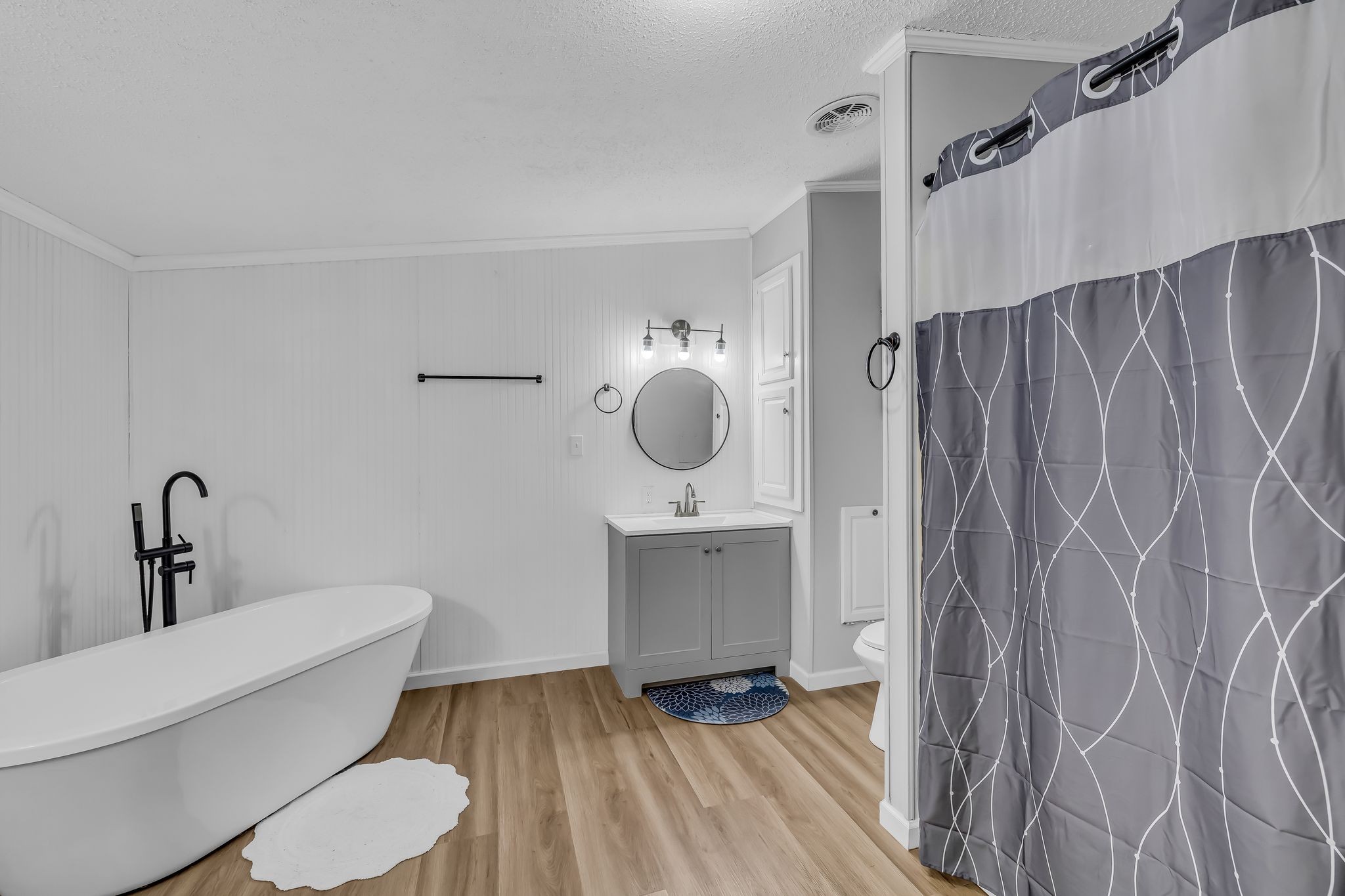 830 Calls Road Estill Springs, TN 37330 - Photo 18 of 35 a bathroom with a sink toilet and shower