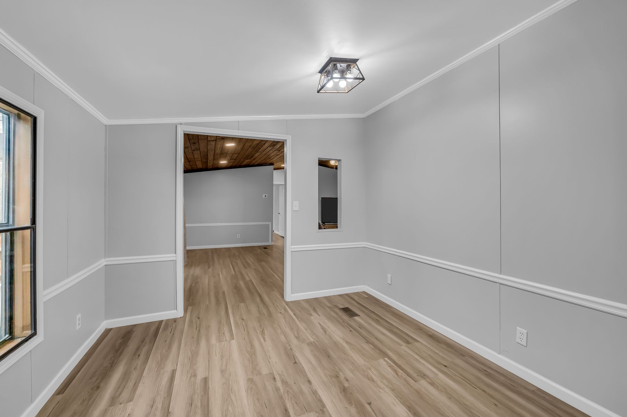 830 Calls Road Estill Springs, TN 37330 - Photo 21 of 35 a view of empty room with wooden floor and fan