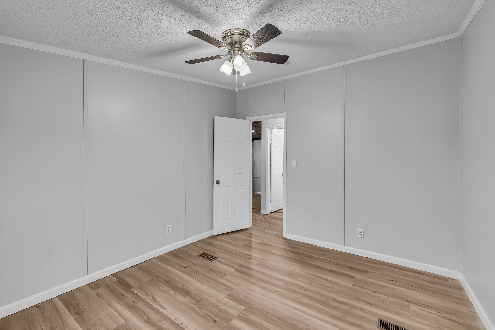 830 Calls Road Estill Springs, TN 37330 - Photo 28 of 35 a view of an empty room with wooden floor