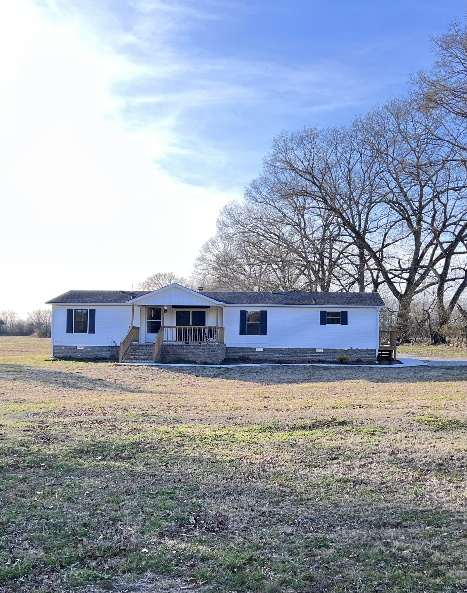 830 Calls Road Estill Springs, TN 37330 - Photo 35 of 35 a view of a yard in front of a house with large tree