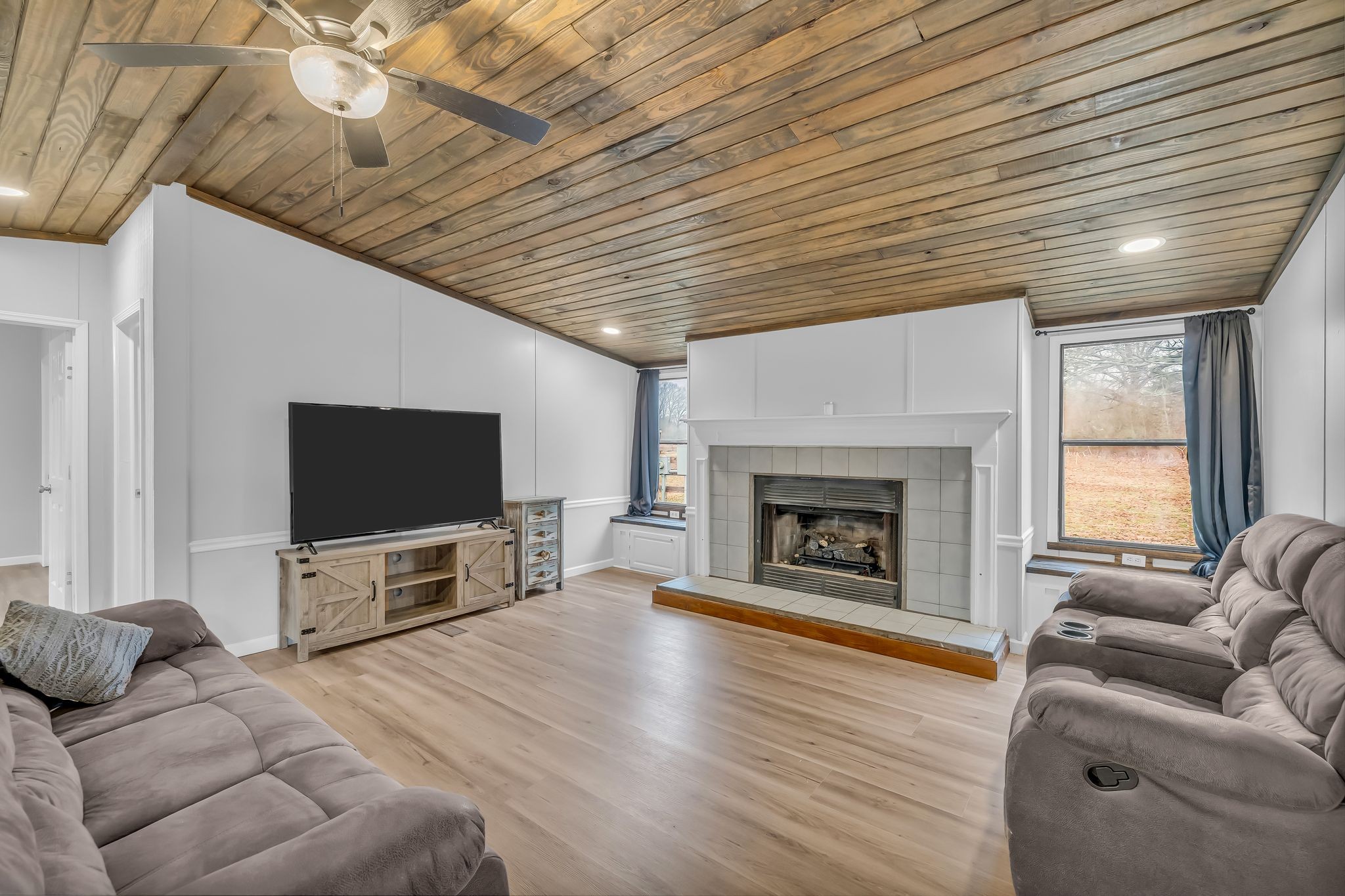 830 Calls Road Estill Springs, TN 37330 - Photo 9 of 35 a living room with furniture and a flat screen tv