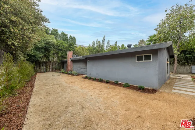 a lake view with a wooden fence