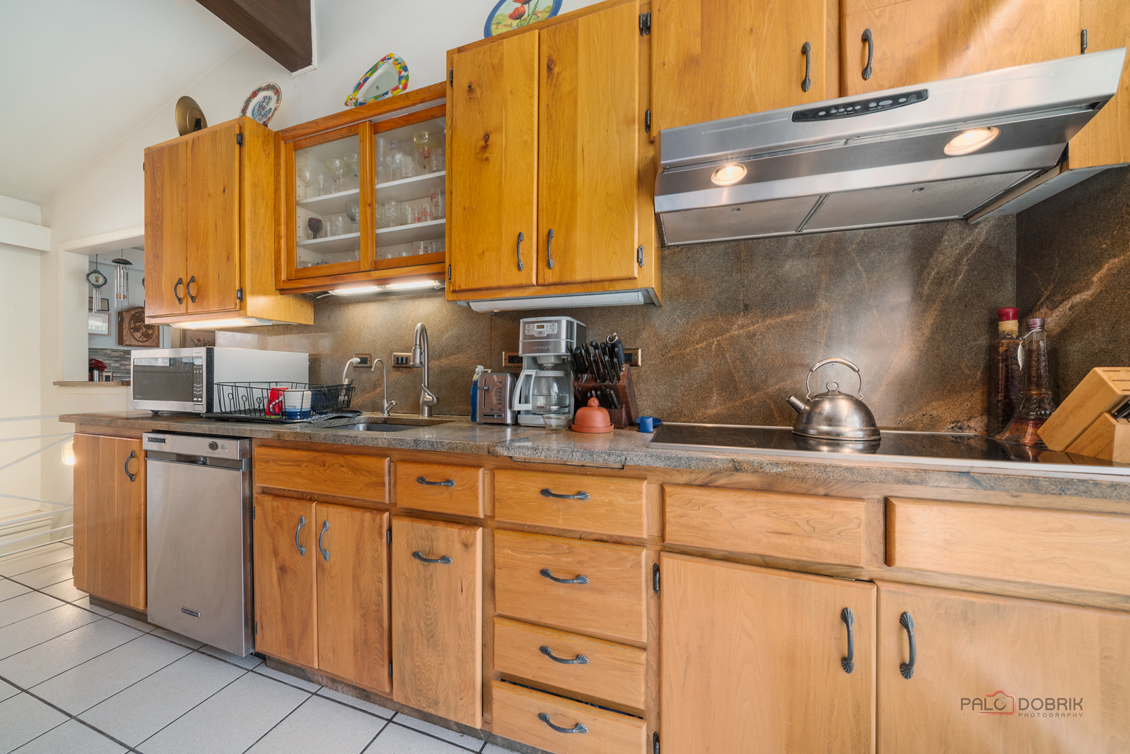 1161 Oak Spring Lane Libertyville, IL 60048 - Photo 12 of 30 a kitchen with stainless steel appliances granite countertop a sink and cabinets
