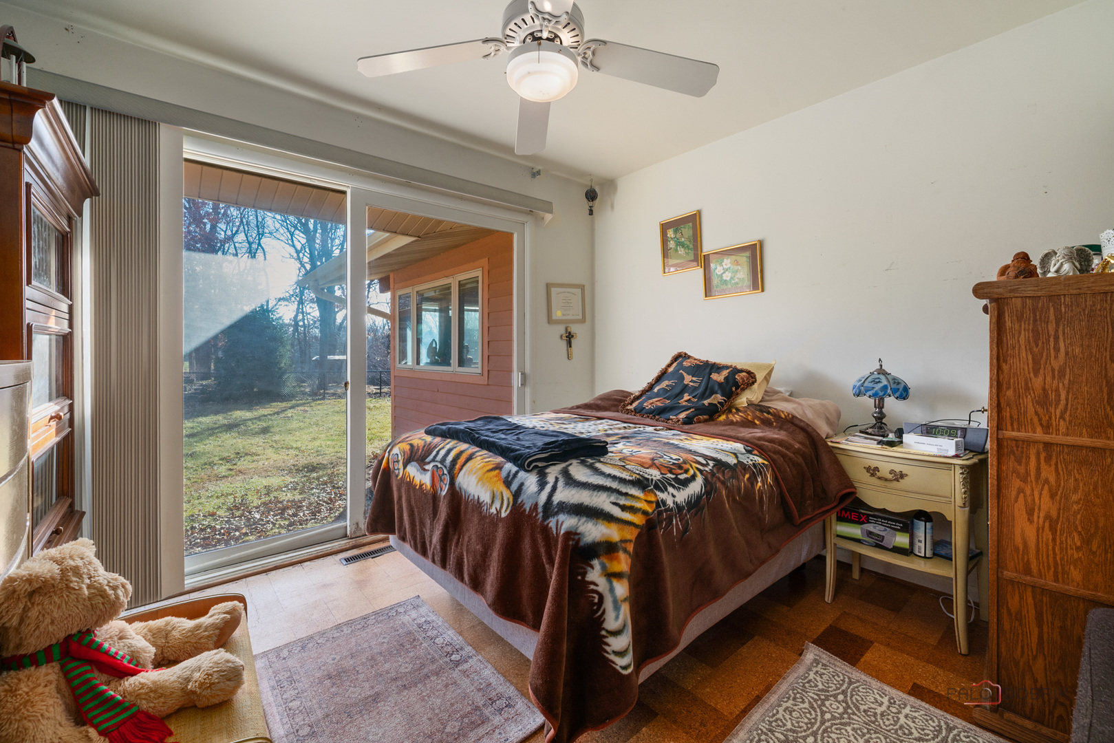 1161 Oak Spring Lane Libertyville, IL 60048 - Photo 15 of 30 a bed sitting in a bedroom next to a window