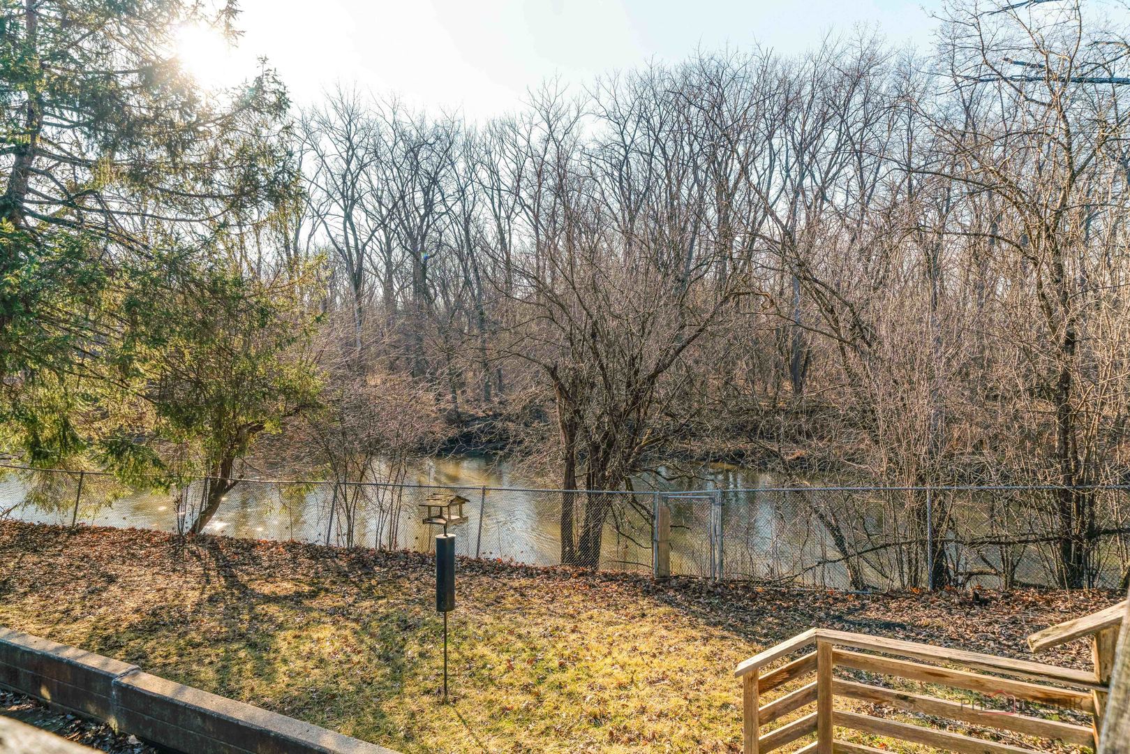 1161 Oak Spring Lane Libertyville, IL 60048 - Photo 23 of 30 a backyard of a house with lots of green space