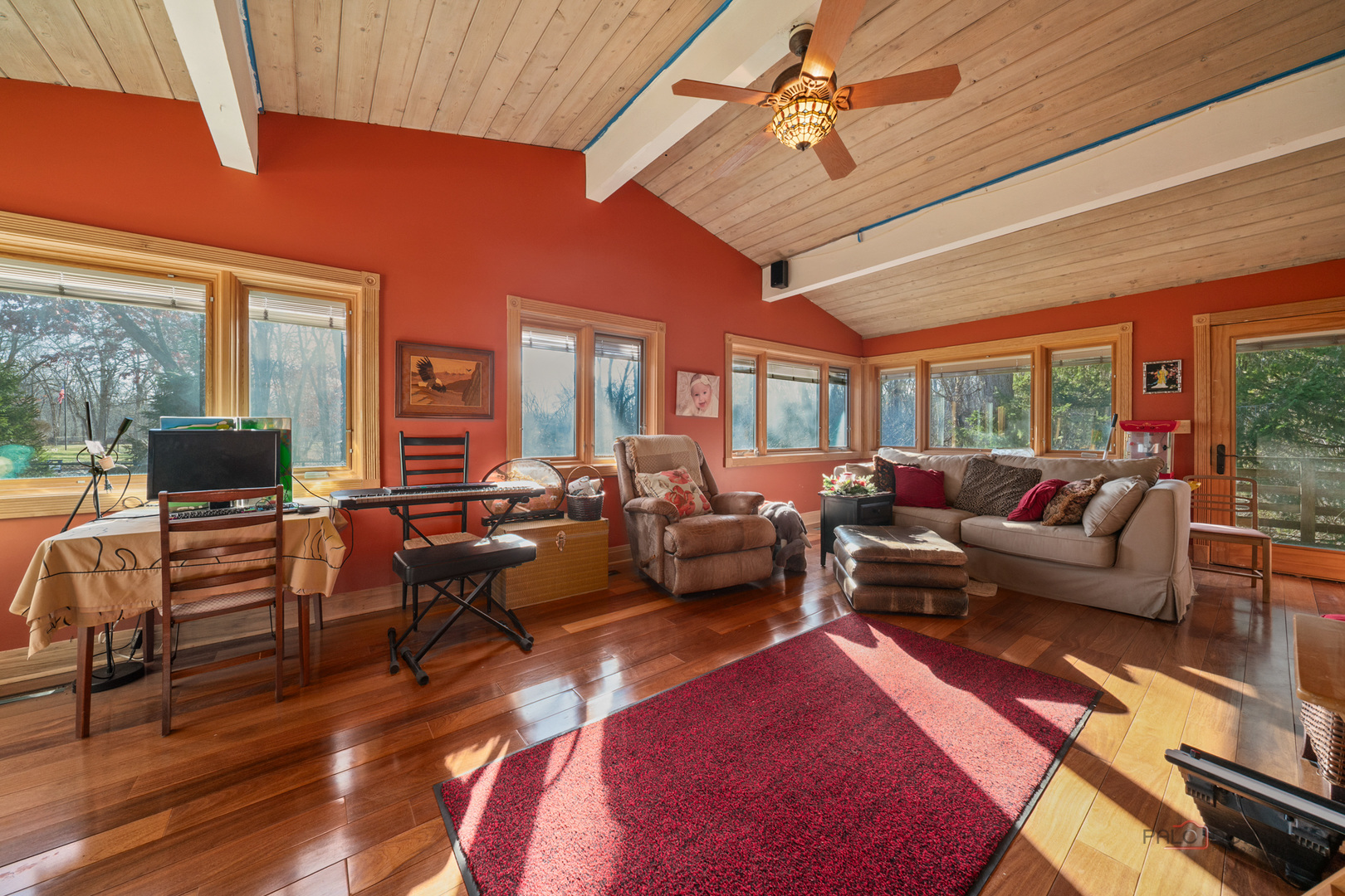 1161 Oak Spring Lane Libertyville, IL 60048 - Photo 7 of 30 a living room with furniture a rug potted plant and a large window