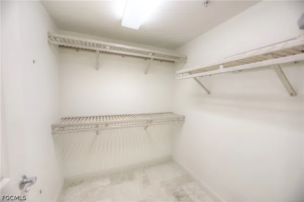 a view of a room with racks on the wall