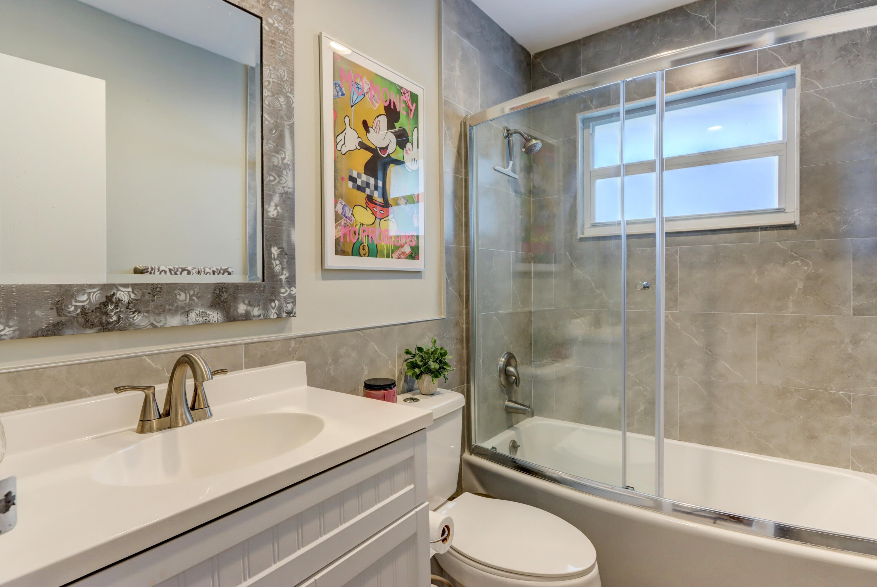 508 Monaco Way Delray Beach, FL 33446 - Photo 18 of 36 a bathroom with a sink toilet and shower