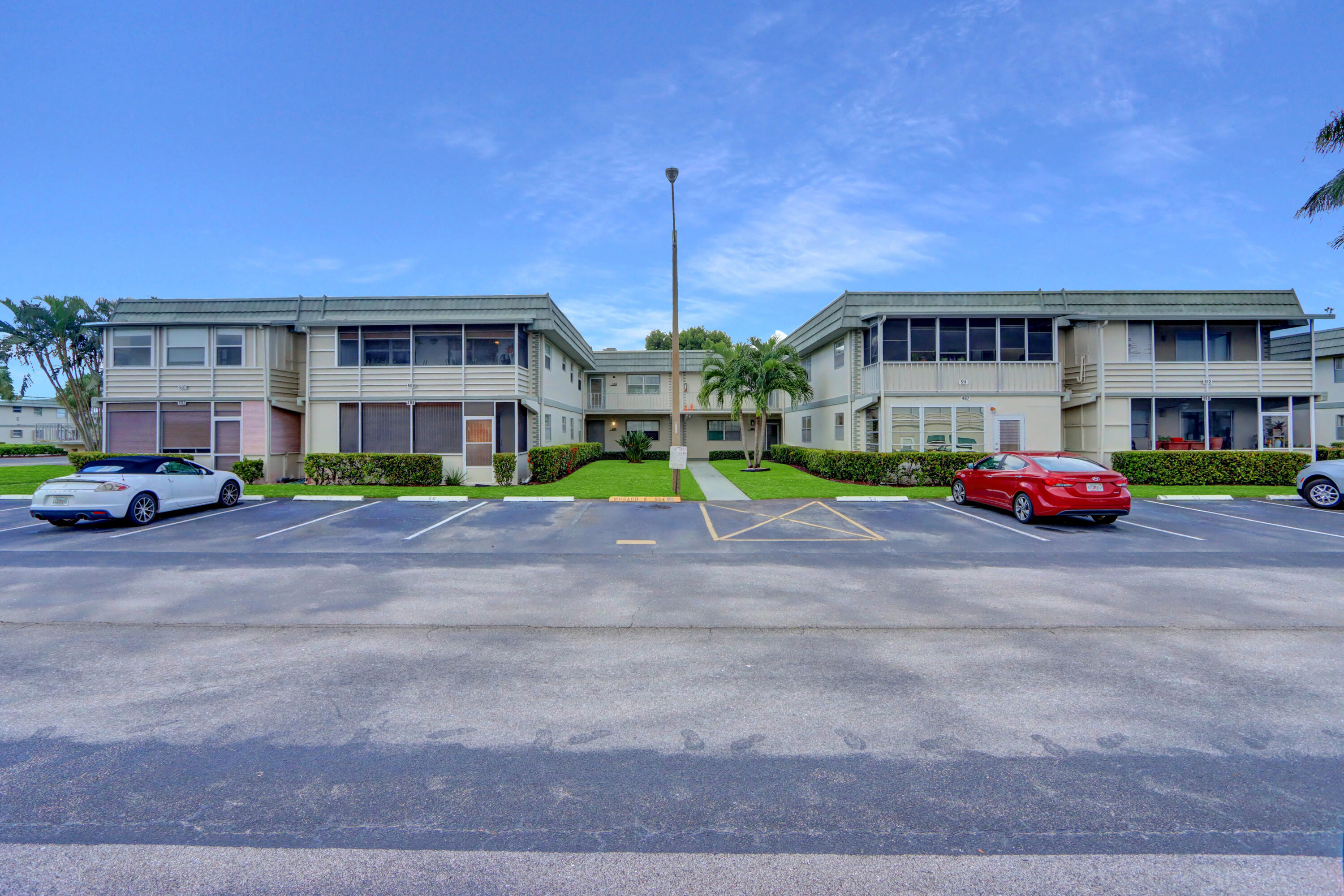 508 Monaco Way Delray Beach, FL 33446 - Photo 25 of 36 a car parked in front of a building