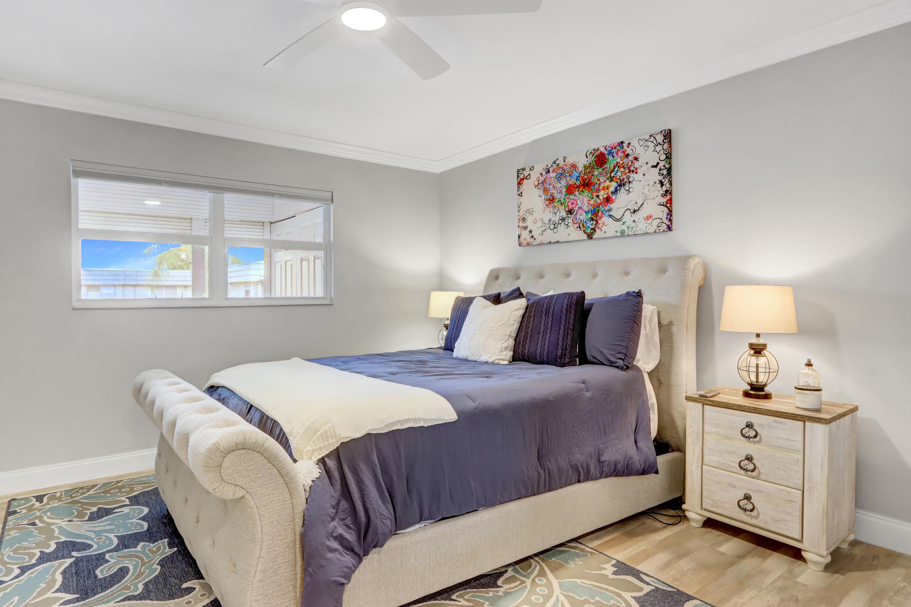 508 Monaco Way Delray Beach, FL 33446 - Photo 10 of 36 a bedroom with a bed and a painting on the wall