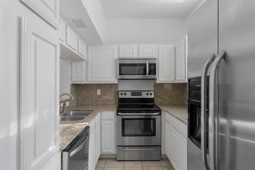 6303 Prospect Avenue, Unit B104 Dallas, TX 75214 - Photo 10 of 36 Stainless Steel appliances include refrigerator, dishwasher, electric range and microwave.