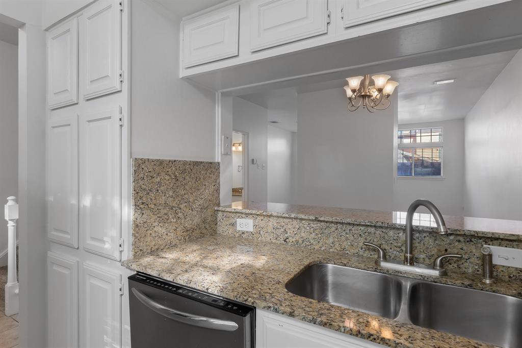 6303 Prospect Avenue, Unit B104 Dallas, TX 75214 - Photo 11 of 36 View from Kitchen into living room.