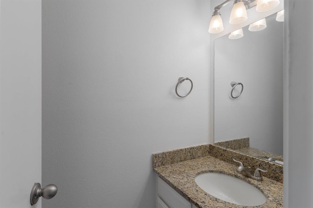 6303 Prospect Avenue, Unit B104 Dallas, TX 75214 - Photo 13 of 36 Half Bath on first floor for guests.
