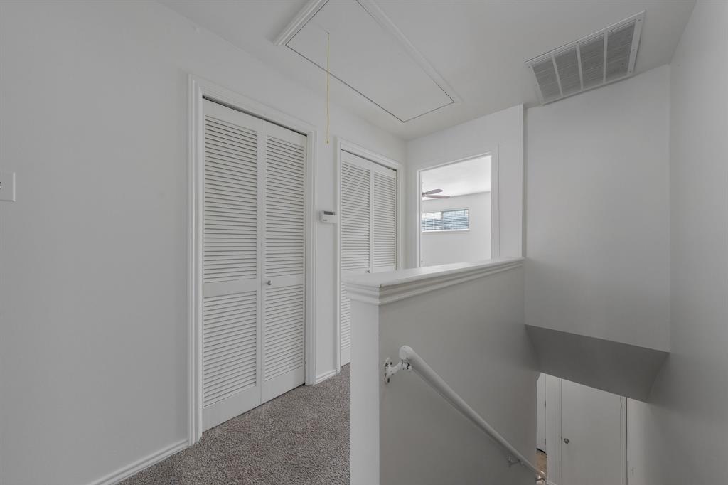 6303 Prospect Avenue, Unit B104 Dallas, TX 75214 - Photo 17 of 36 Upstairs hallway, utility closet.