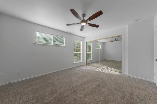 a bathroom with a shower and a bathtub