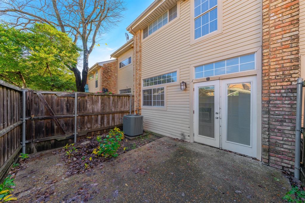 6303 Prospect Avenue, Unit B104 Dallas, TX 75214 - Photo 27 of 36 Rear view of house with a patio area and french doors