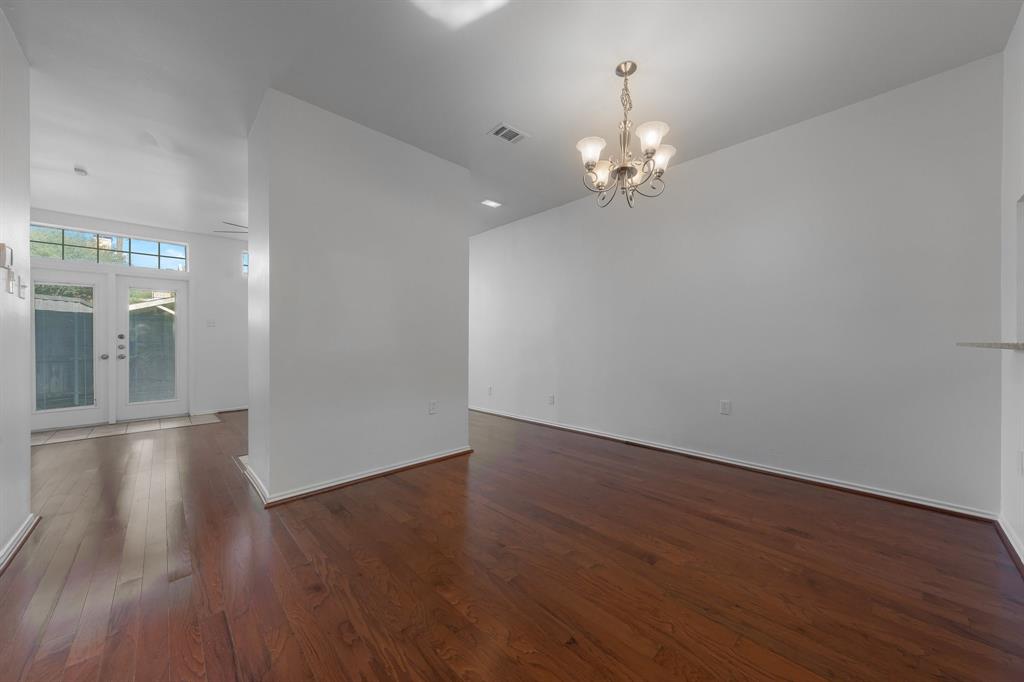 6303 Prospect Avenue, Unit B104 Dallas, TX 75214 - Photo 33 of 36 Open Floor plan features beautiful hardwood floors.