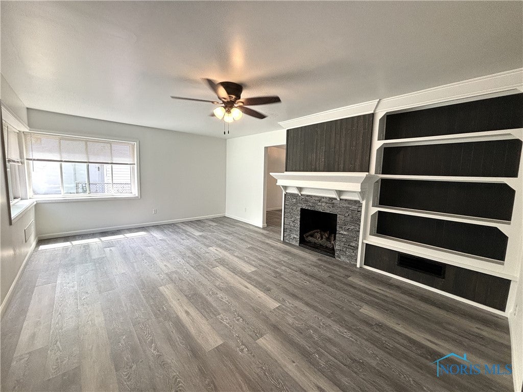 3427 Goddard Road Toledo, OH 43606 - Photo 5 of 37 Gas Fireplace with Built Ins