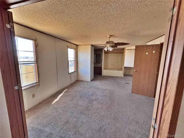 a bathroom with a tub and a shower