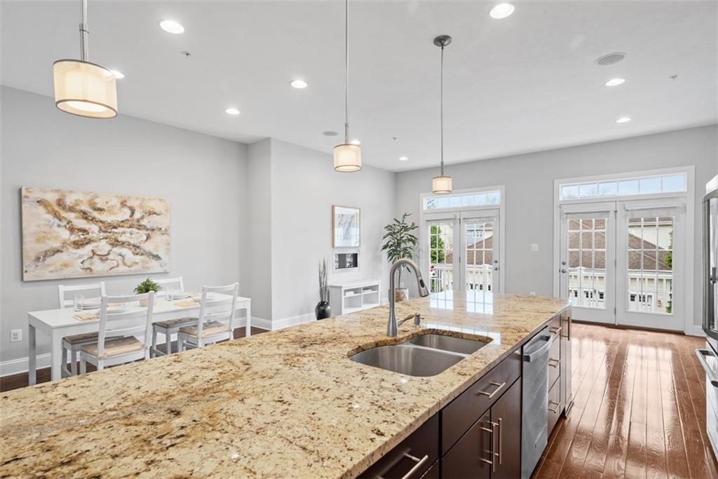 218 Venango Trail Mars, PA 16046 - Photo 11 of 42 a kitchen with stainless steel appliances kitchen island granite countertop a sink and a refrigerator
