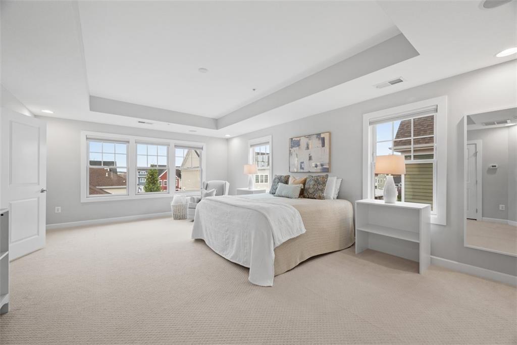 218 Venango Trail Mars, PA 16046 - Photo 15 of 42 a spacious bedroom with a large bed and a window