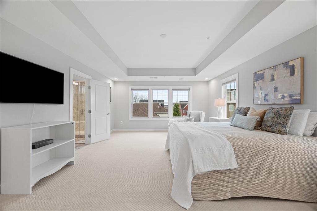 218 Venango Trail Mars, PA 16046 - Photo 17 of 42 a spacious bedroom with a bed and a flat screen tv