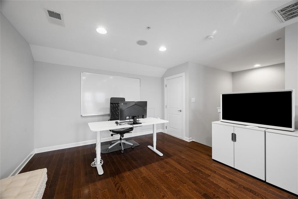218 Venango Trail Mars, PA 16046 - Photo 27 of 42 a view of a workspace with wooden floor and a window