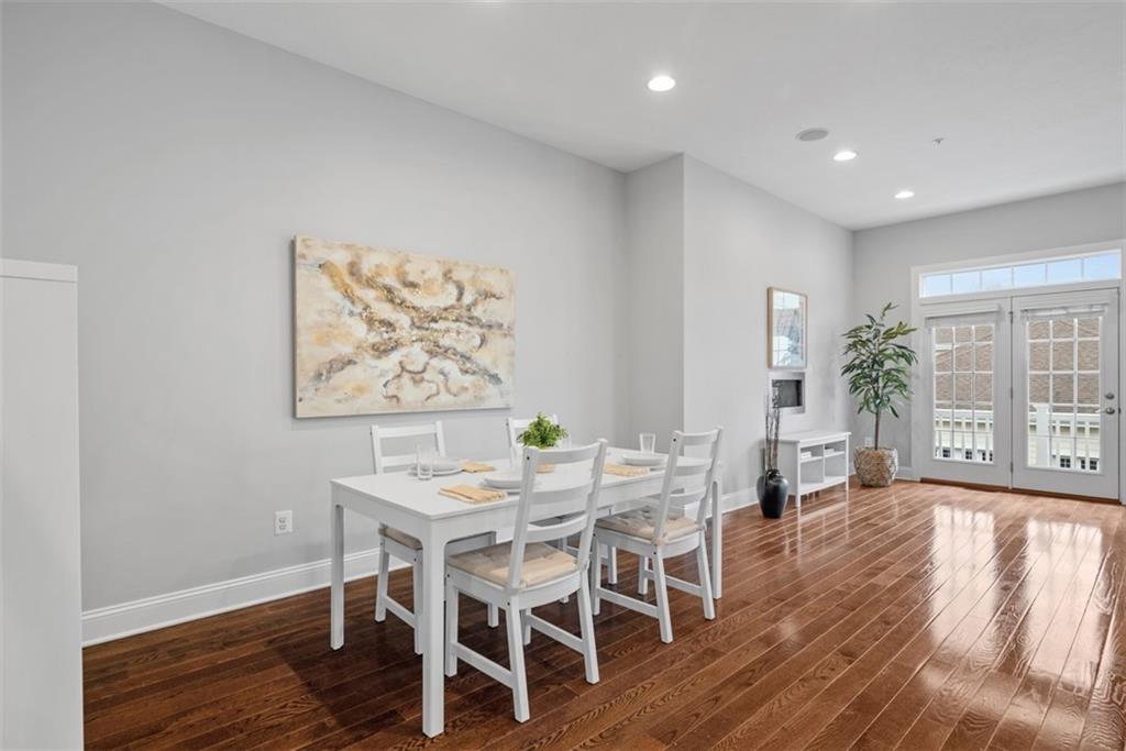 218 Venango Trail Mars, PA 16046 - Photo 10 of 42 a view of a dining room with furniture window and wooden floor