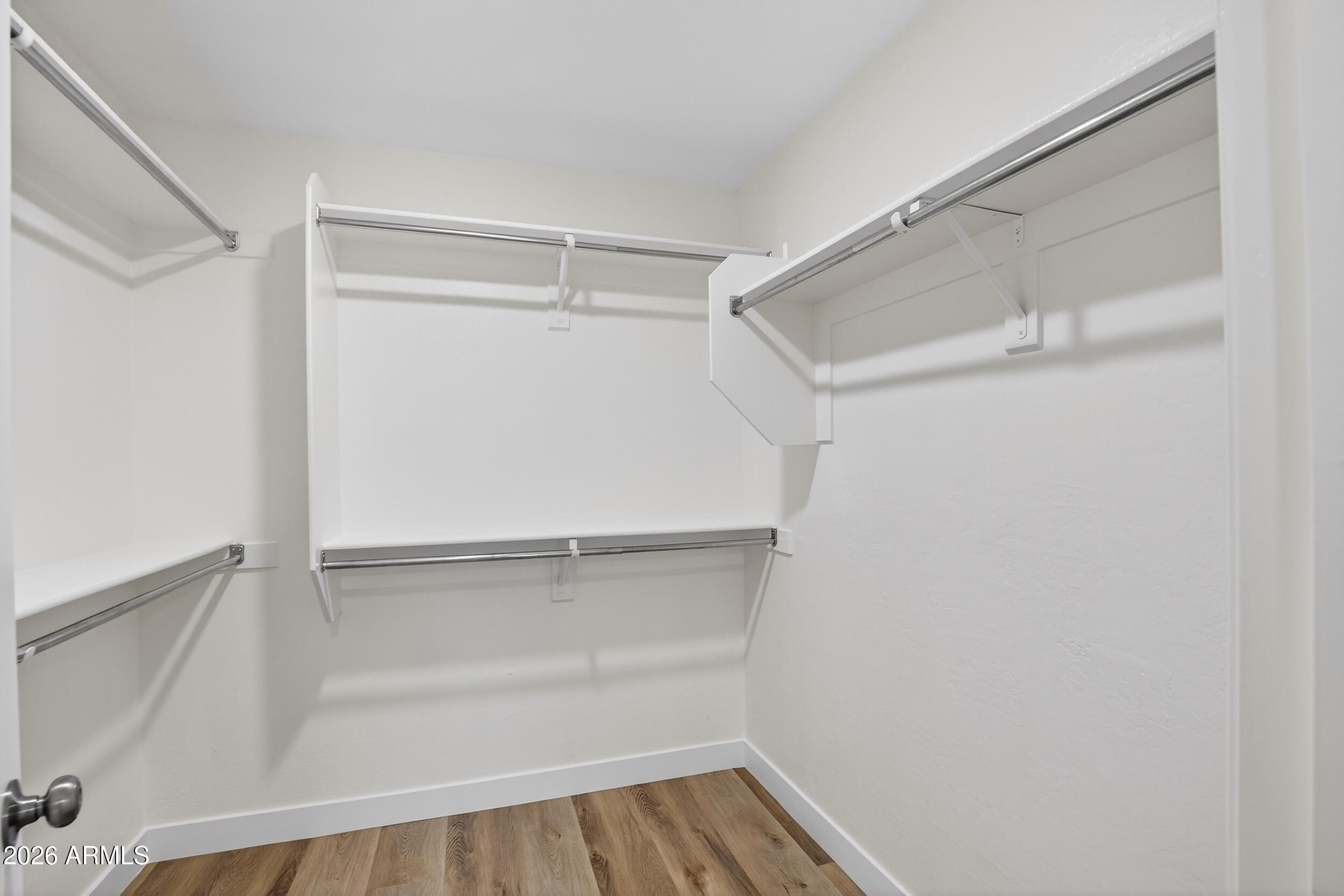 43620 West Cowpath Road Maricopa, AZ 85138 - Photo 44 of 60 a view of an empty walk in closet