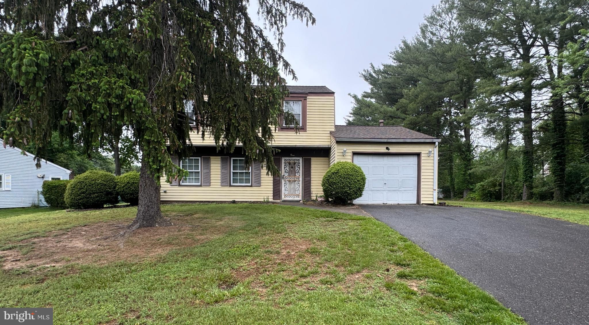 3 Fairmount Drive Willingboro, NJ 08046 - Photo 2 of 5 a front view of a house with a yard and trees