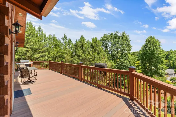 a view of balcony with furniture