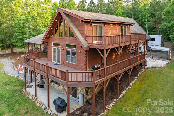 a view of a house with wooden stairs