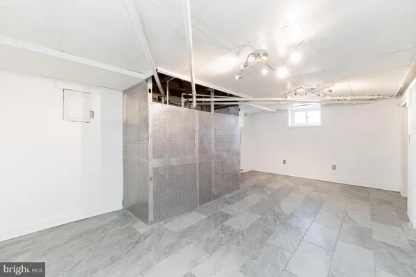 a view of a room with racks on the wall