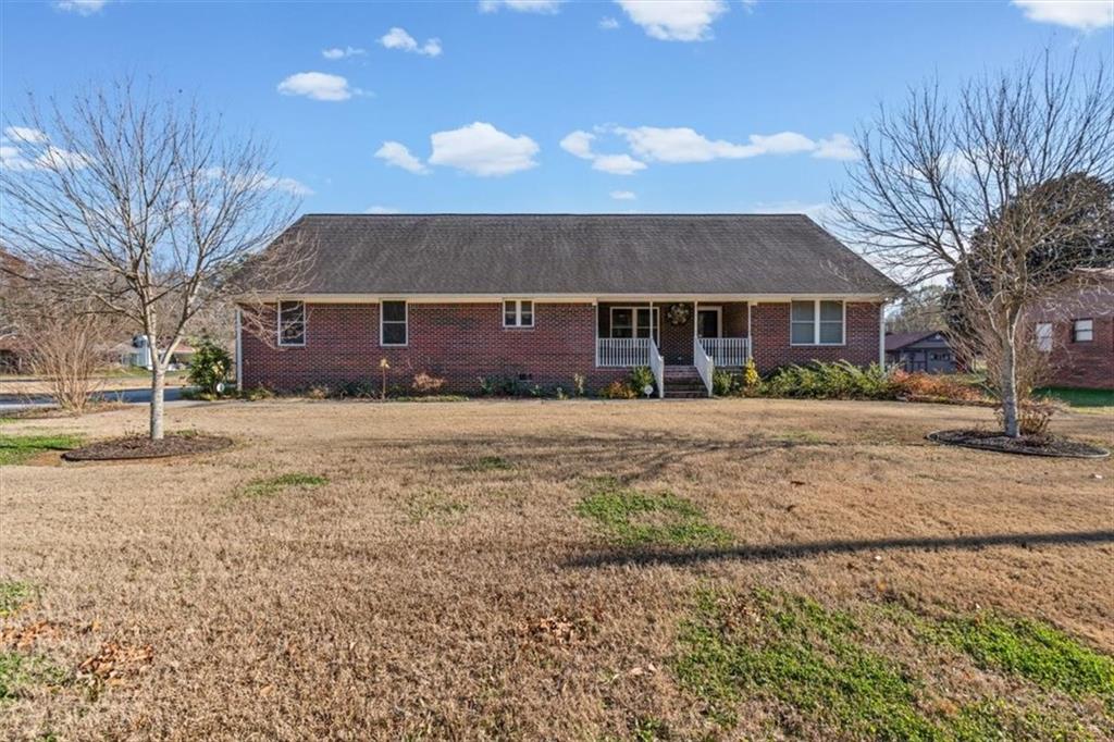 11 Paige Street Cartersville, GA 30121 - Photo 2 of 49 a front view of house with yard and trees