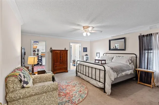 a bedroom with furniture and a couch