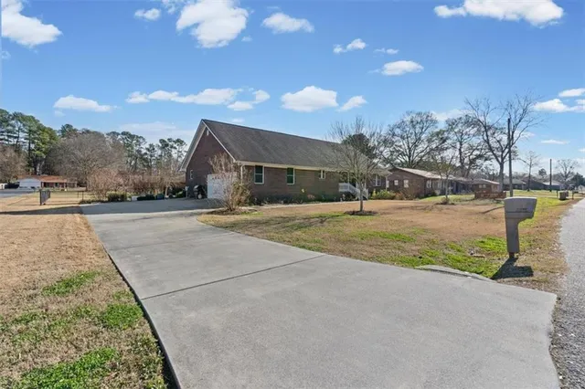 a view of building with yard