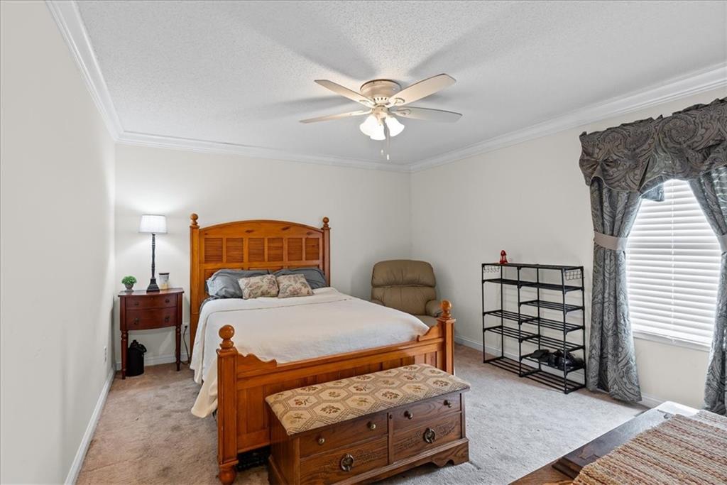 11 Paige Street Cartersville, GA 30121 - Photo 31 of 49 a bedroom with a bed and a window