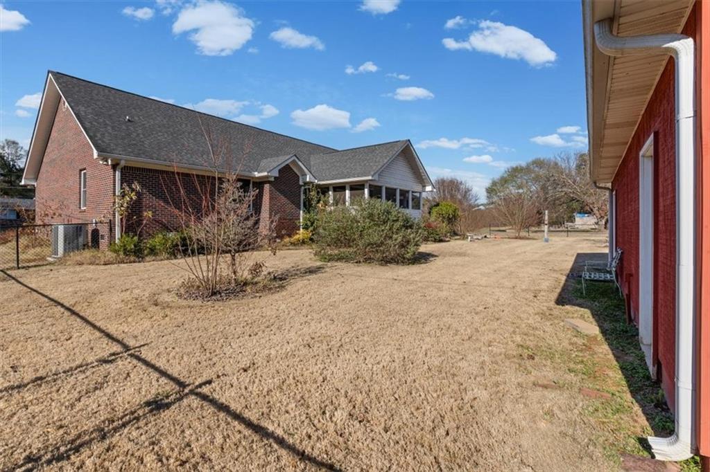 11 Paige Street Cartersville, GA 30121 - Photo 39 of 49 a view of a house with a snow in the yard