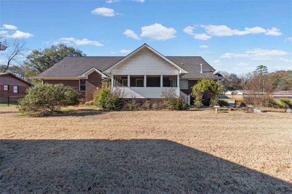 11 Paige Street Cartersville, GA 30121 - Photo 42 of 49 a front view of a house with a yard