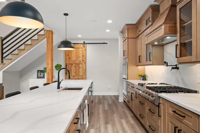 a bathroom with a double vanity sink mirror and